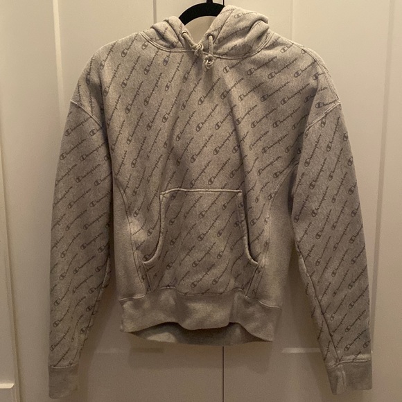 A grey Champion hoodie - Picture 1 of 3